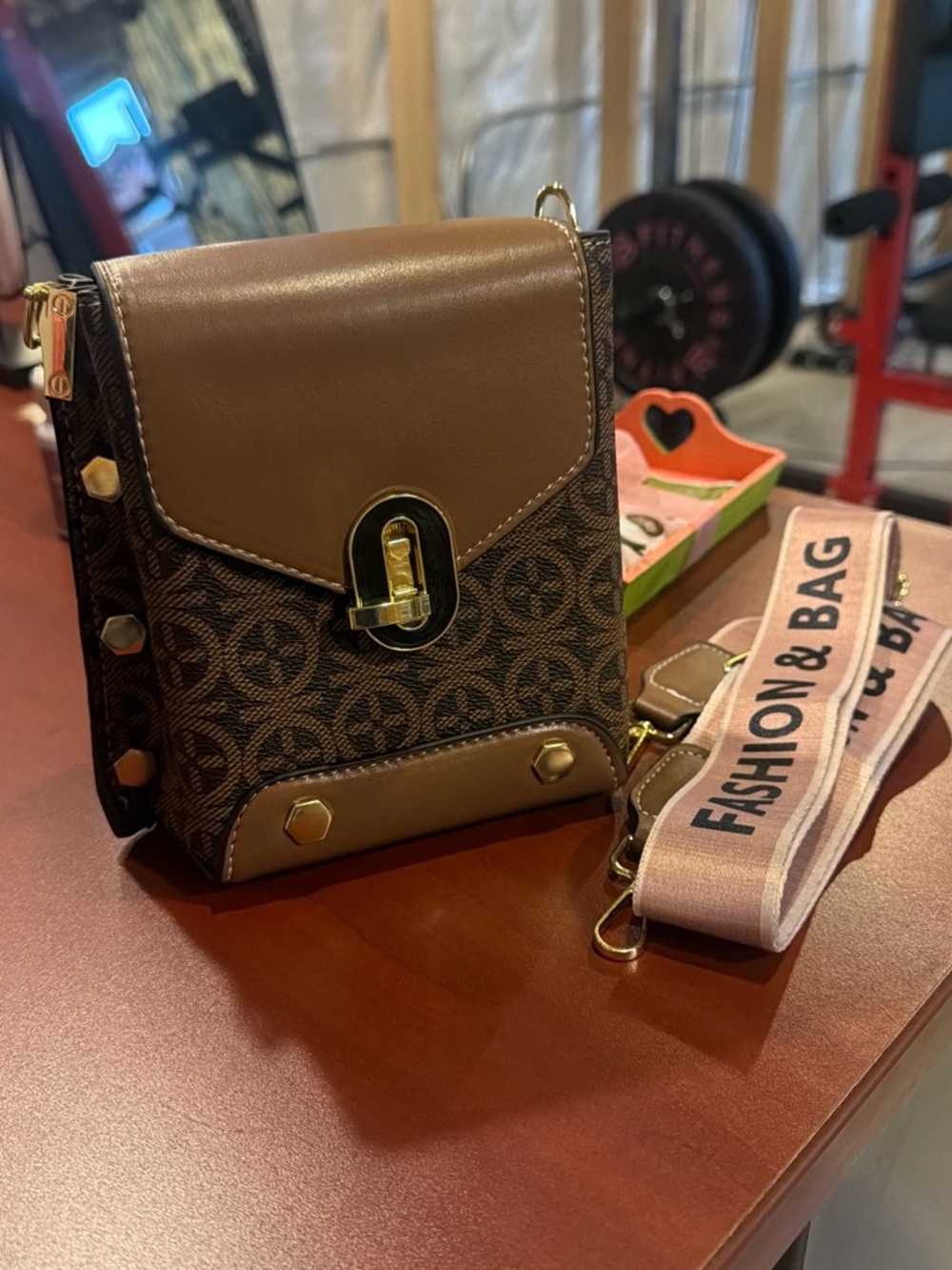 Brown Patterned Crossbody Bag with Pink Adjustable Strap